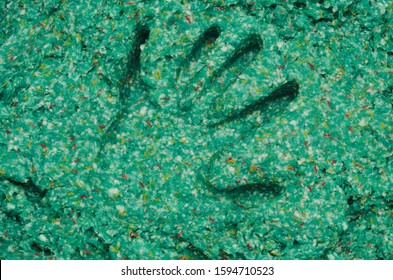 handprint on a soft abstract green background - Powered by Shutterstock