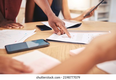 Hands Of Advertising Or Marketing Planning Team Working On Strategy On A Table In A Startup Office. Corporate Workers Read Graph Data Documents To Research Popular Market Trends In Business Meeting