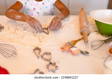 Hands Of African American Messy Girl Baking In Kitchen. Baking And Cooking, Childhood And Leisure Time At Home.