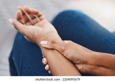 Hands, Arm Injury Or Pain Of Black Woman After Working Hard In Home Or House Interior. Hand, Health And Wellness Of African Female Injured Wrist After Work On Pc Computer, Carpal Tunnel Or Arthritis.