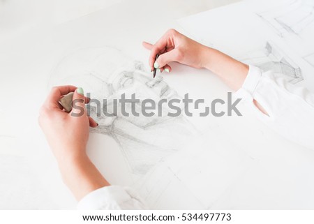 Hands of artist drawing portrait with pencil. Creating human face picture in workshop, student painter pov. Art, craft, talent, inspiration, creativity concept