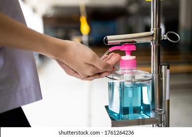 Hands Of Asian Girl Washing Hand With Hand Sanitizer,tool, Equipment  Of Alcohol Antiseptic Gel,use Feet Instead Of Hands,reduce Touch,disinfection Of Coronavirus,COVID-19,health Care,new Normal Life