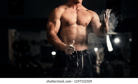 The Hands Of An Athlete Close Up. Photo Exercise In The Gym. Go In For Sports. Jock