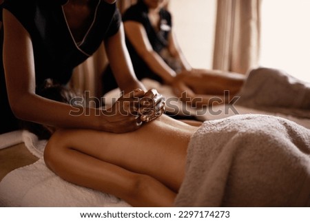 Hands, back massage and woman in spa with luxury service for muscle, body and relax with peace in resort. Masseuse, hospitality and physical therapy on bed for wellness, zen and healing in salon