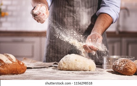  hands of the baker's male knead dough