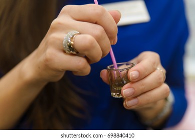 Hands Of Beautician- Makeup Artist Applies Paint Henna , Design, Trimmed Eyebrows In A Beauty Salon In The Session Correction. Professional Care For Face.