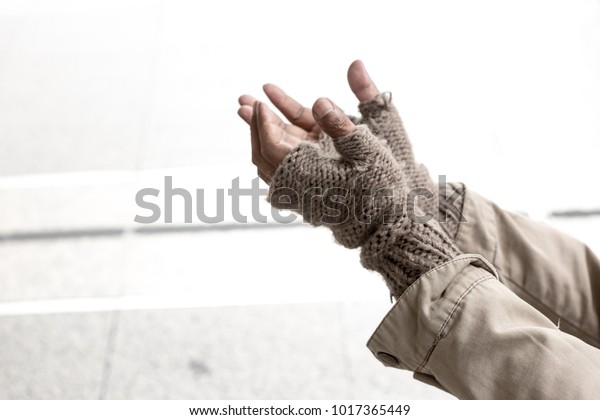 hands of beggar  begging for
money