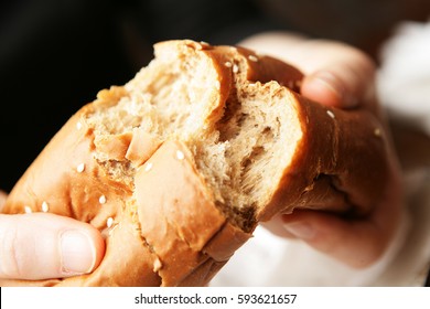 Hands Breaking Bread 