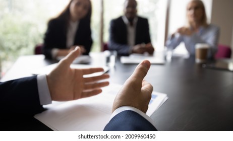 Hands Of Business Leader, Executive, Boss, Coach Talking To Diverse Team, Explaining Marketing Reports To Employees, Speaking Before Audience On Office Meeting, Conference. Cropped Banner, Close Up