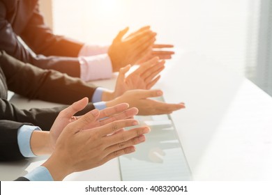 Hands Of Business People Clapping To Speaker