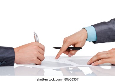 Hands Of Business People In Elegant Suits Sitting At Desk Working In Team Together, With Document Point Finger On Paper Sign Up Contract, Concept, Business Plan. Isolated Over White Background