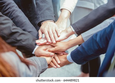 
hands of business people. Partner show power promise to trust, respect, reliable and integrity in their work mission. Respect  important join big job. Partnership touch stack hand fist bump for trust