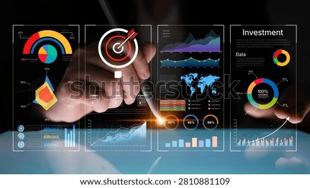 Hands of a business professional analyzing data visualizations and metrics for investment opportunities using modern technology and digital charts