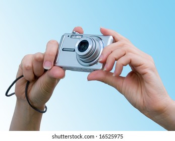 Hands with a camera