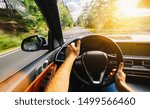 hands of car driver on steering wheel, Driving car at summer day on a country road, having fun driving the empty highway on tour journey - POV, first person view shot