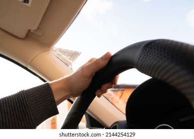 Hands Of Car Driver On Steering Wheel, Fast Driving Car At Spring Day On A Country Road, Having Fun Driving The Empty Highway On Tour Journey - POV First Person View Shot