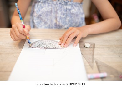 Digital composite of Hand drawing ruler on blackboard Stock Photo