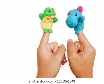hands of children playing animals fingers puppet isolated on blackground.