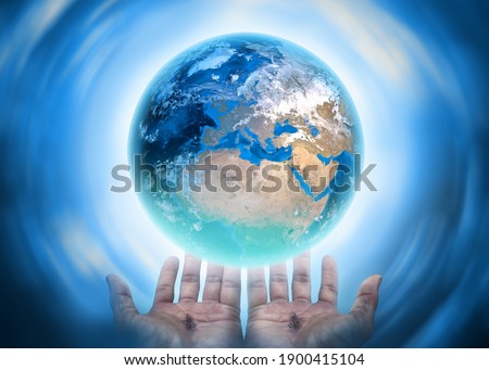 Hands of Christ saving the earth conceptual theme.