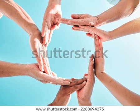 Hands circle, synergy and below with sky, group and family with support, motivation or love. People, men and women with hand together for solidarity, bonding or outdoor with vacation, summer and help