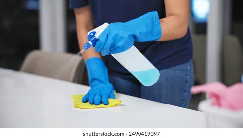 Hands, cleaner and sanitizer for hygiene, fresh and disinfectant for virus protection or housekeeping. Person, worker and spray for bacteria, disease and prevention in office as janitor for company - Powered by Shutterstock