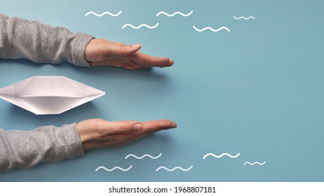 Hands Clear The Way To Remove Obstacles In The Way Of The Boat . A Symbol Of Protection Of Life And An Easy Way In Life