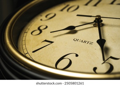 The hands of the clock are moving close-up