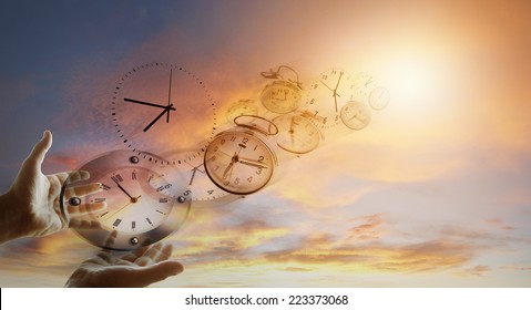 Hands and clocks in sky