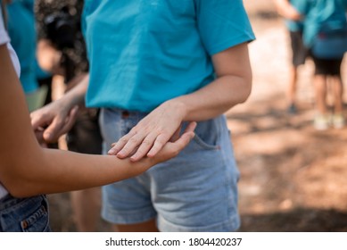 hands in hands close unrecognizable