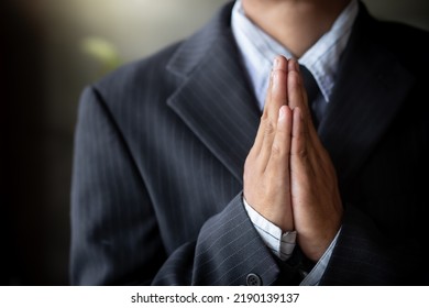 Hands Close Up. Christian Man In A Suit Praying.