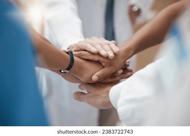 Hands, collaboration and healthcare with a medicine team in a huddle or circle in the hospital for insurance or medical. Teamwork, motivation and solidarity with a doctor and nurse group in a clinic - Powered by Shutterstock