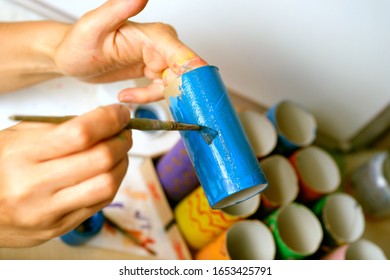 hands color toilet paper rollers for children's creativity. roller brush drawings - Shutterstock ID 1653425791