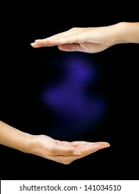 Hands with colored mist