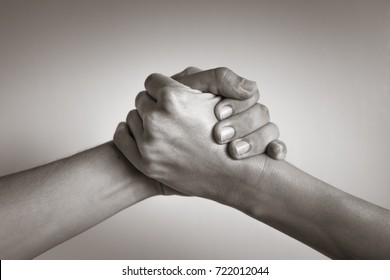 Hands Coming Together, Helping Hand. People Working Together, Unity, Agreement.
