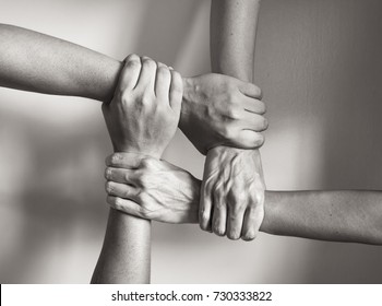 Hands Coming Together. In Unity There Is Strength. 