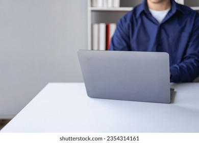 Hands of contemporary young office manager on laptop keyboard during working, surfing net, shopping online or online job. close up pictures - Shutterstock ID 2354314161