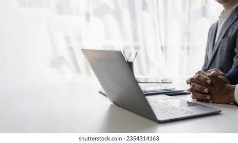 Hands of contemporary young office manager on laptop keyboard during working, surfing net, shopping online or online job. close up pictures - Shutterstock ID 2354314163