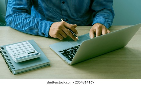 Hands of contemporary young office manager on laptop keyboard during working, surfing net, shopping online or online job. close up pictures - Shutterstock ID 2354314169