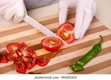 Hands of cook preparing salad - Powered by Shutterstock