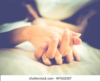 Hands Of Couple Lovers Having Sex On A Bed In Morning With Lust And Love