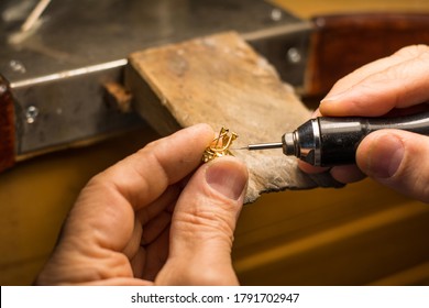 Hands of a craftsman jeweler working on jewelry. Goldsmith.
Goldsmith workshop jewels and articles of work value - Shutterstock ID 1791702947