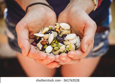 Hands Cupping Homemade Trail Mix