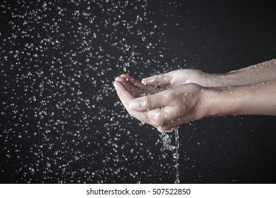 Hands Cupping Under Shower