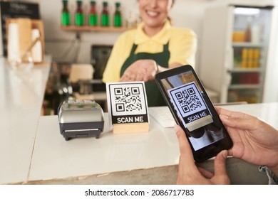 Hands Of Customer Scanning QR Code With Smartphone To Order Take Out Food Online Via App