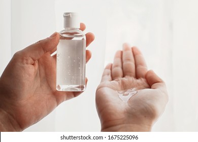 Hands disinfection. Hands with disinfecting alcohol gel and sanitizer bottle, prevent virus epidemic. Prevention of flu disease and coronavirus. Cleaning and disinfecting hands in proper way.