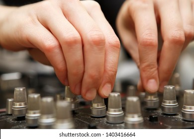 Hands Of Dj Playing Music On House Party.Female Disc Jockey Mixing Musical Tracks On Entertainment Event In Night Club.Professional Sound Mixer On Concert