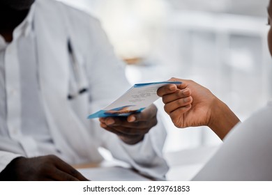 Hands Of Doctor Giving Flyer To Patient About Hospital Help, Medical Clinic Contact Us Information. Sick Black Woman With Health Problem Consulting A Professional Healthcare Worker, Nurse Or Expert