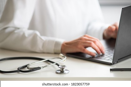 Hands Of Doctor Working On Laptop Tele Medicine Concept