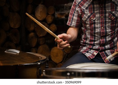 Hands Of Drummer With Sticks And Drums Close-up