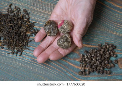 Hands Elderly Woman Holding A Handful Of Tea Leaves. 